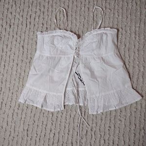 Eyelet ruffle lace front top